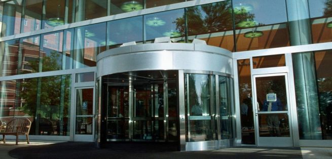 large commercial building with revolving door